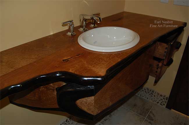 custom made mesquite bathroom countertop with one drawer open